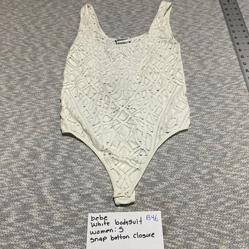 Bebe white bodysuit with geometric cut-out pattern size S. SKU-B46#bebe